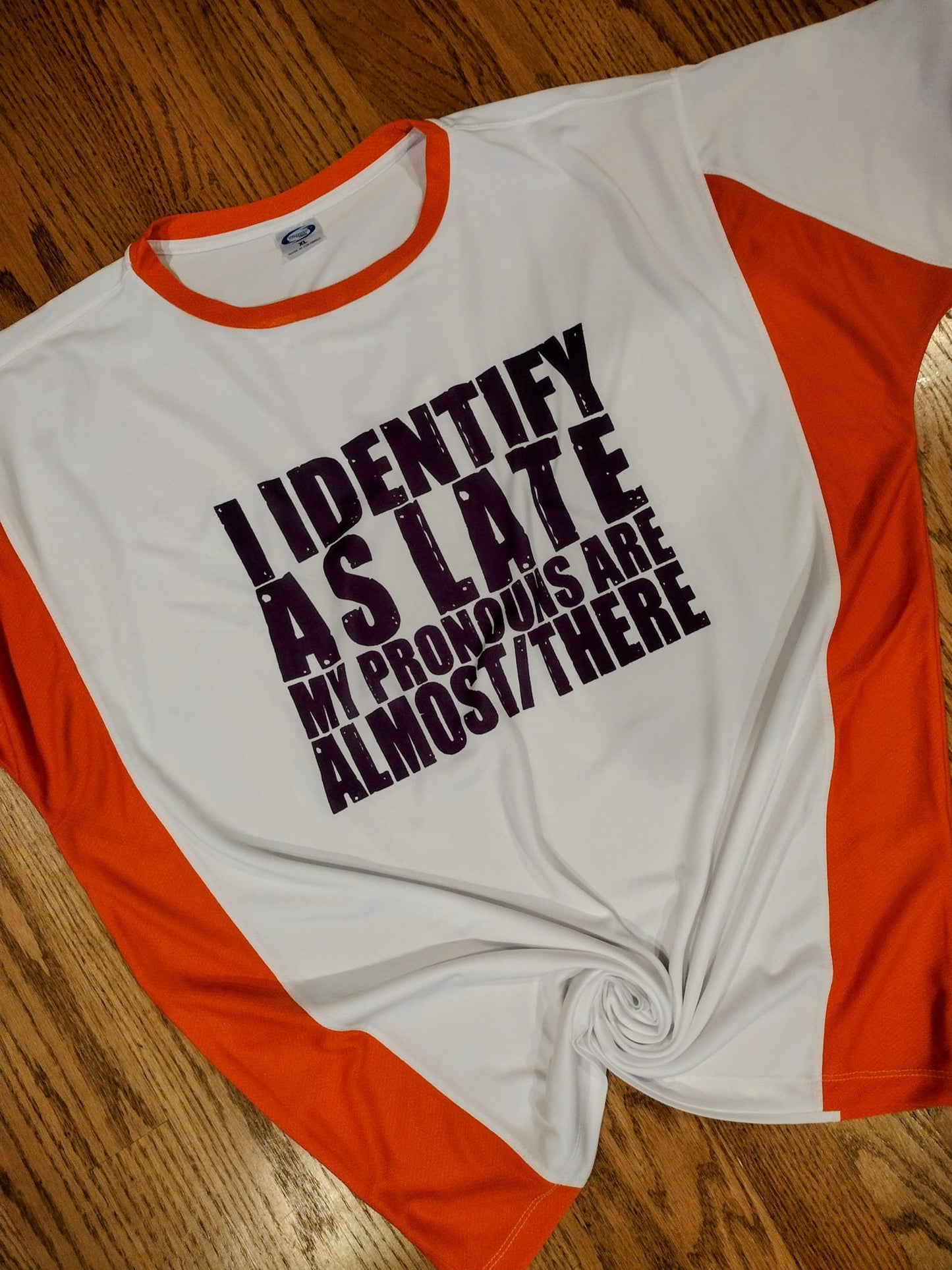 I identify as late tee