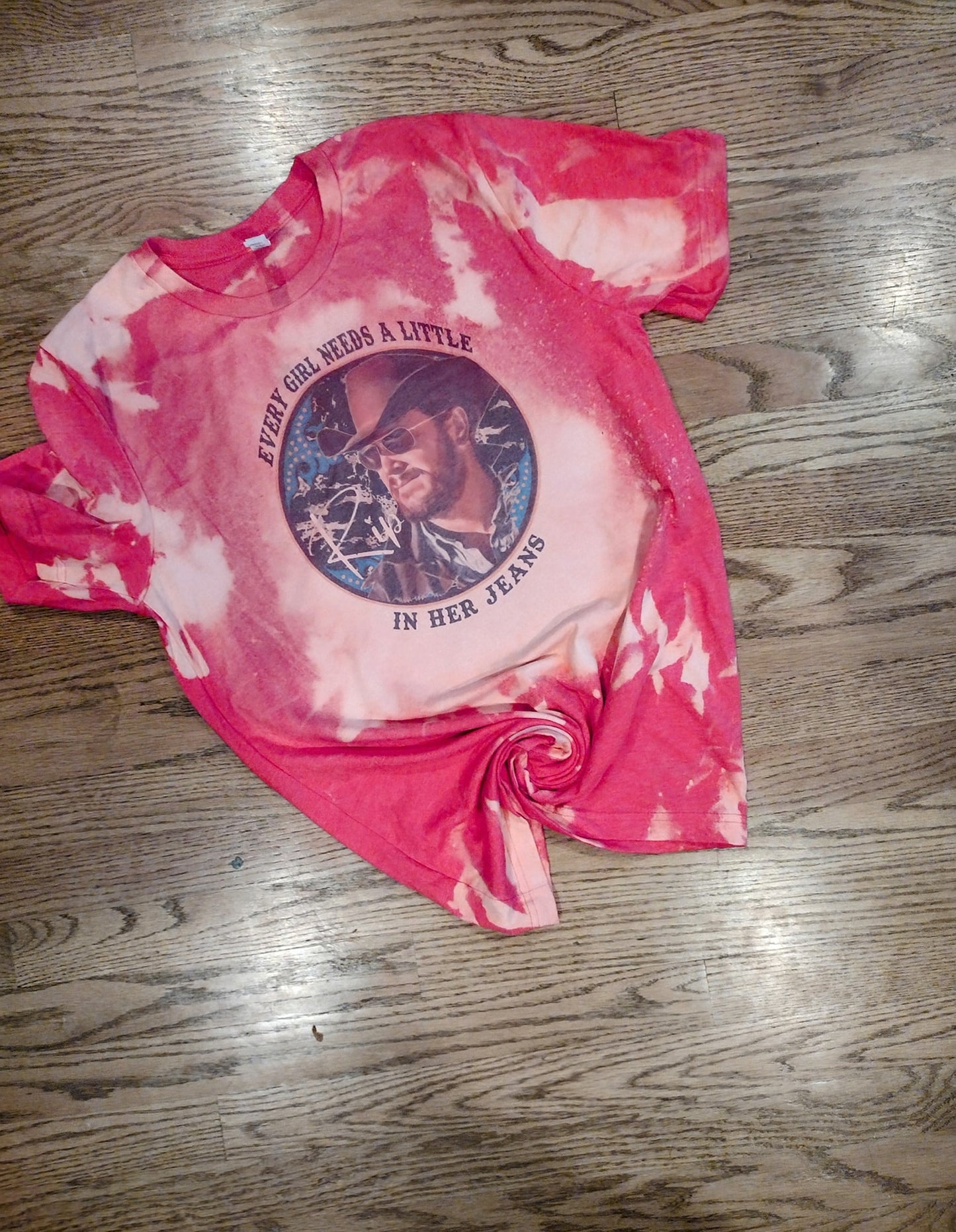 Rip in her jeans shirt